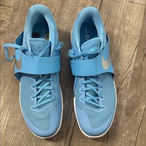 Nike Light Blue Sneakers with Silver Accents